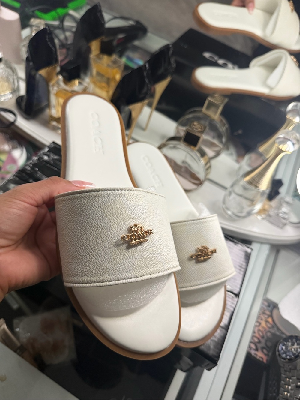 COACH White Slide Mules with Gold Logo Hardware